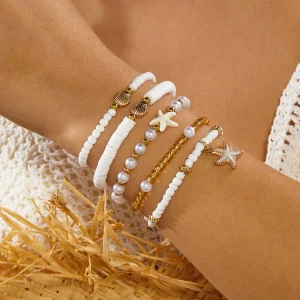 Coastal Boho Stacked Bracelets - Shell, Starfish & Pearl Layers for Summer Escapes
